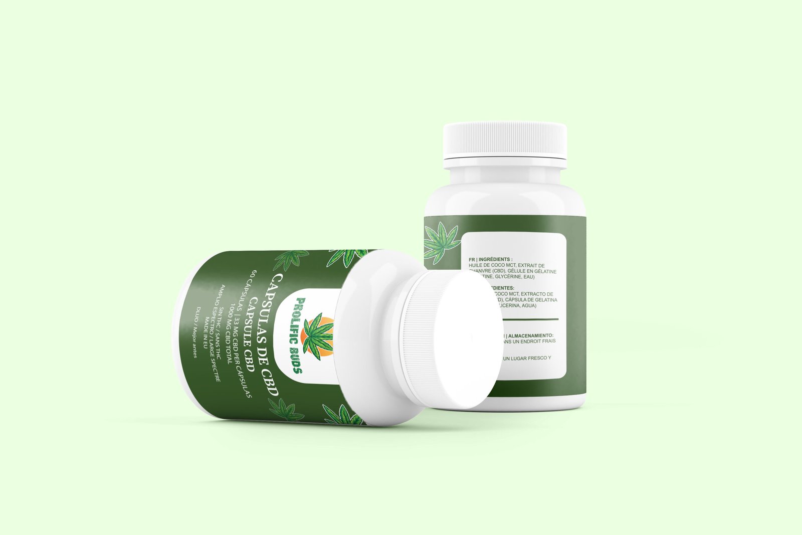White CBD tablets in a glass jar with hemp leaves in the background.